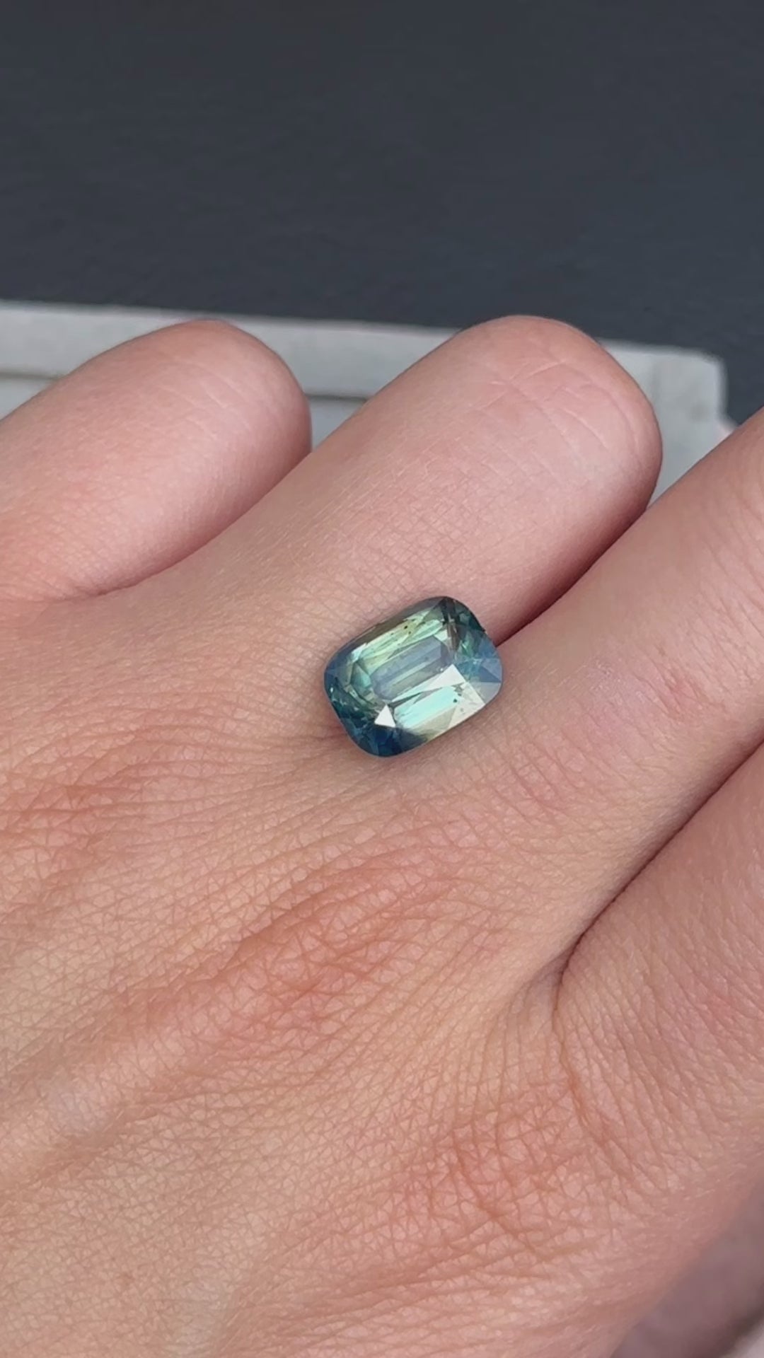 Discover the allure of this utterly exquisite 6.11ct cushion-cut sapphire, perfect for becoming the centrepiece of your dream jewelry. Its mesmerizing facets capture a spectrum of rich forest tones, making it an exceptional and unique gemstone. 6.11 ct shield cut Sri Lankan sapphire. Sourced first hand by us at Kingdom Jewelry!