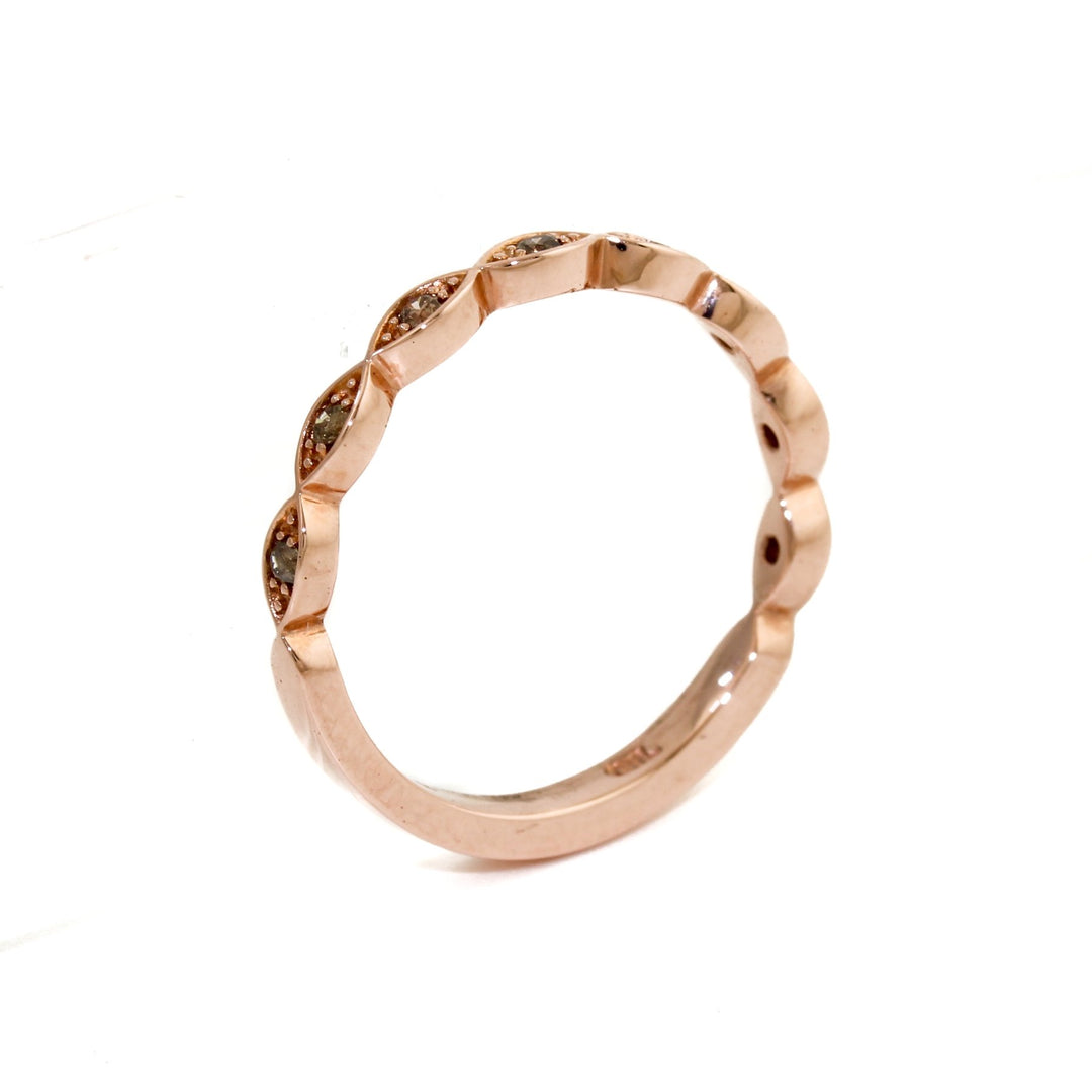 Gorgeous contemporary tiara style ring lined with diamonds that can be stacked with an engagement ring creating a wedding suite, or stacked up and added to your collection!