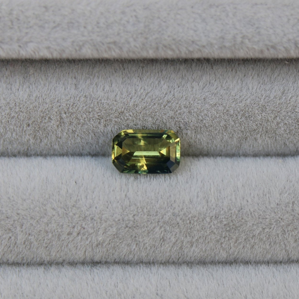 
                      
                        0.60ct Emerald Cut Parti Sapphire - Kingdom Jewelry
                      
                    