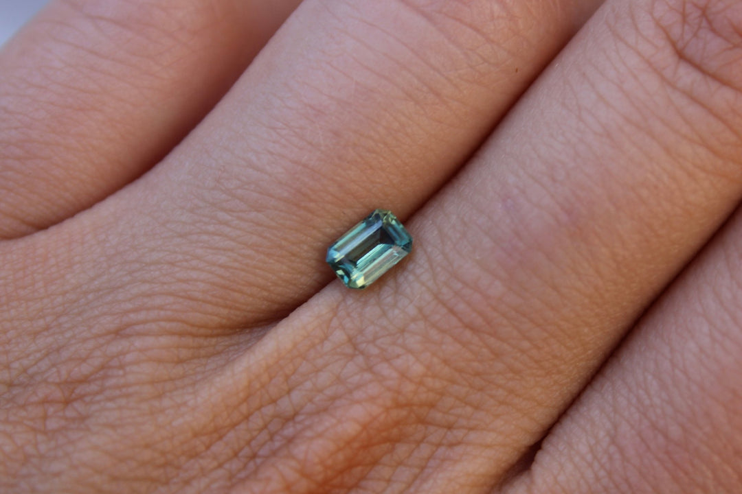 0.80ct Emerald Cut Aqua Teal Sapphire - Kingdom Jewelry