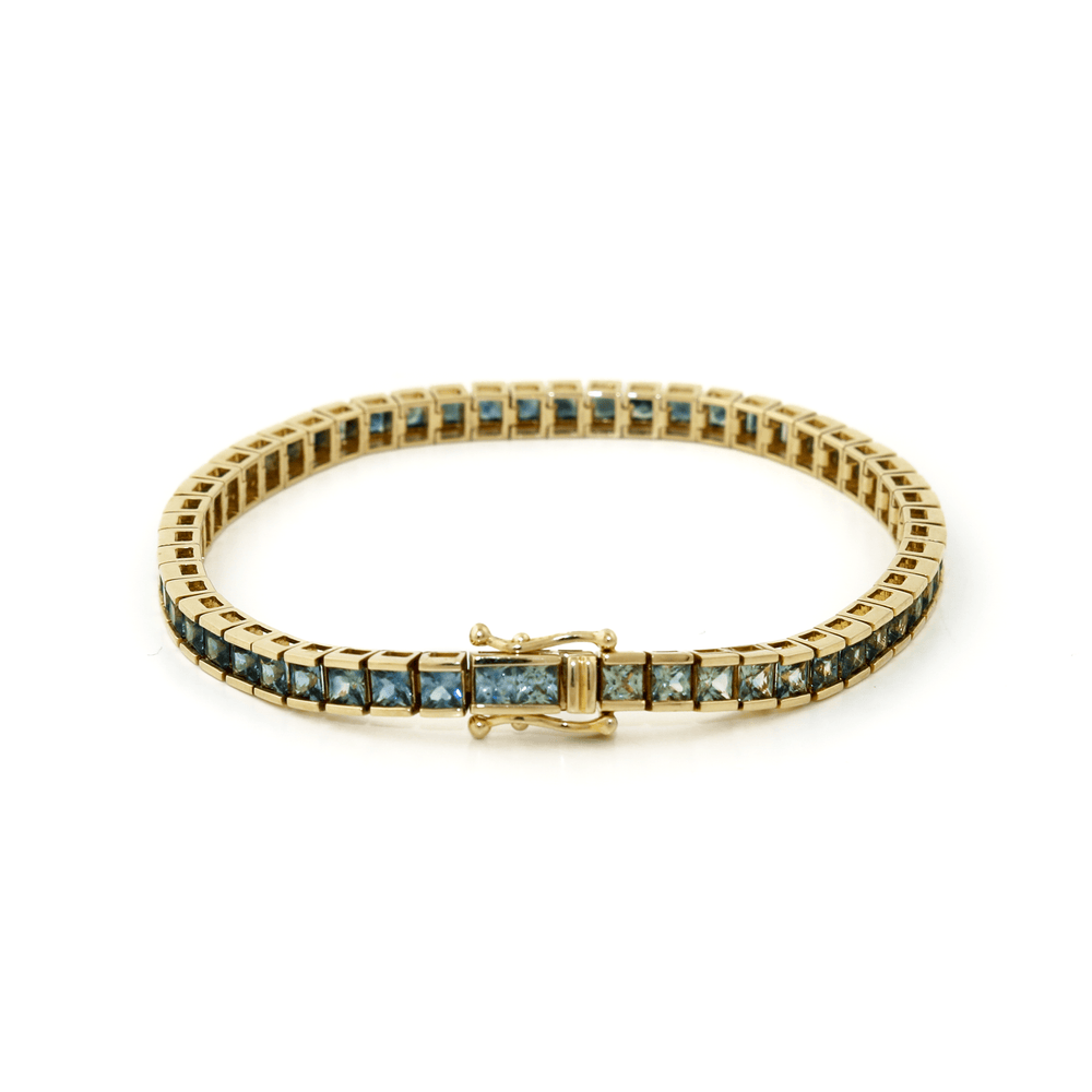 
                  
                    14k Gold x 4mm Ombré Gradient Teal Sapphire Tennis Bracelet - Kingdom Jewelry
                  
                