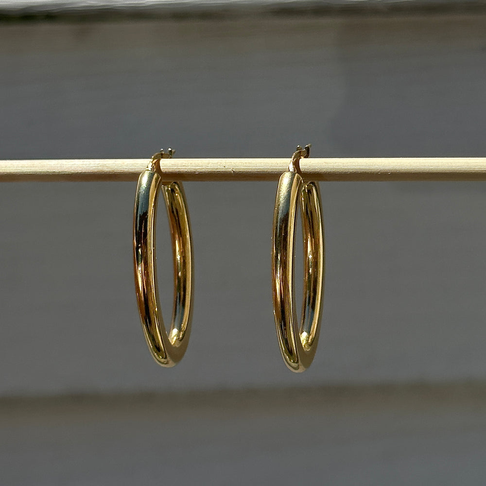 
                      
                        18k Long Oval Hoops
                      
                    