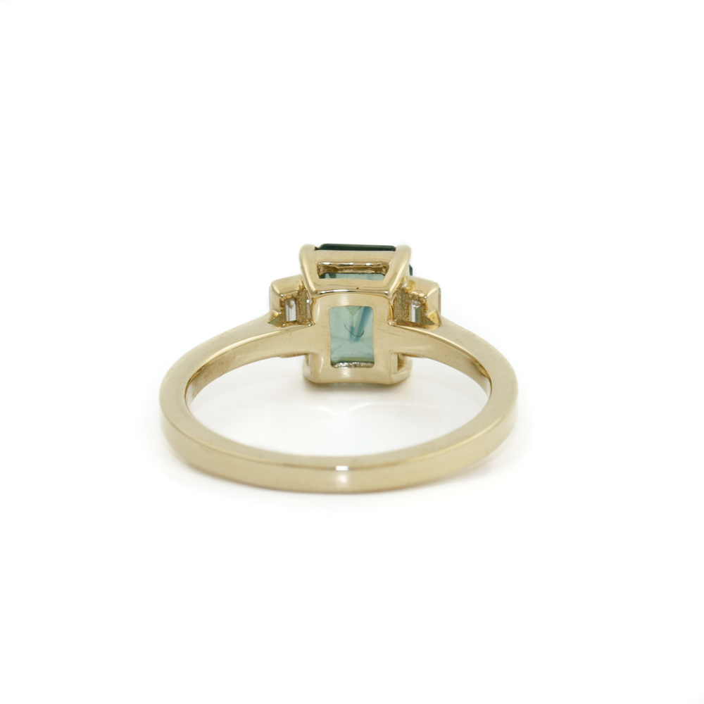 
                      
                        14k Gold x Teal Madagascan Sapphire & Baguette Diamond Ring
                      
                    