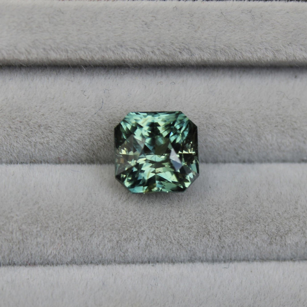 
                      
                        3.40ct Asscher Teal Sapphire - Kingdom Jewelry
                      
                    