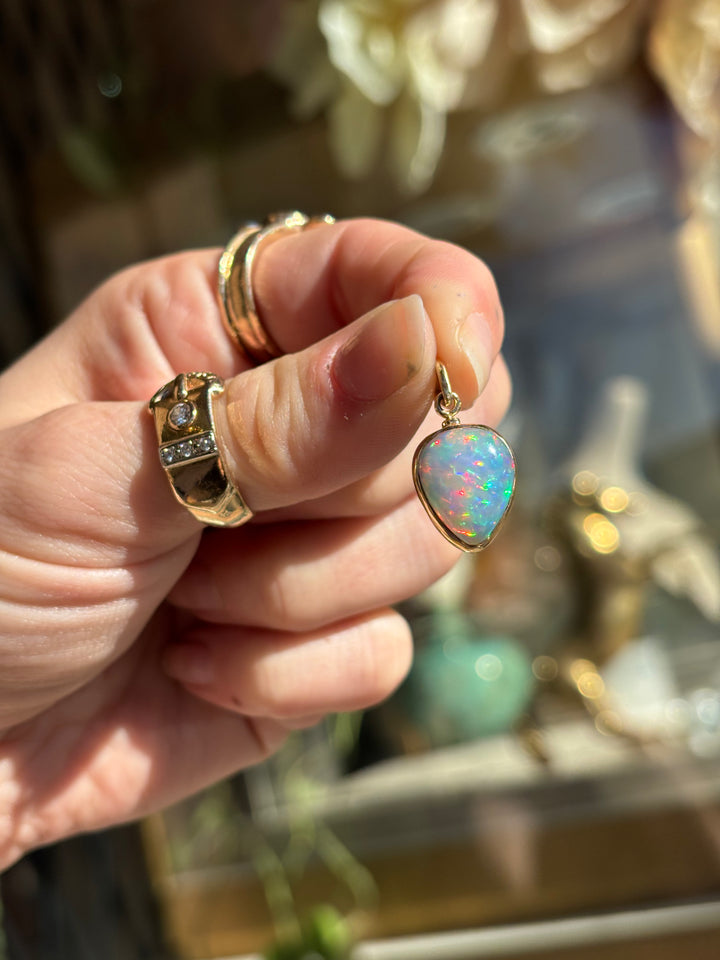 14K & 18K Inverted Pear Shaped Welo Opal Pendant