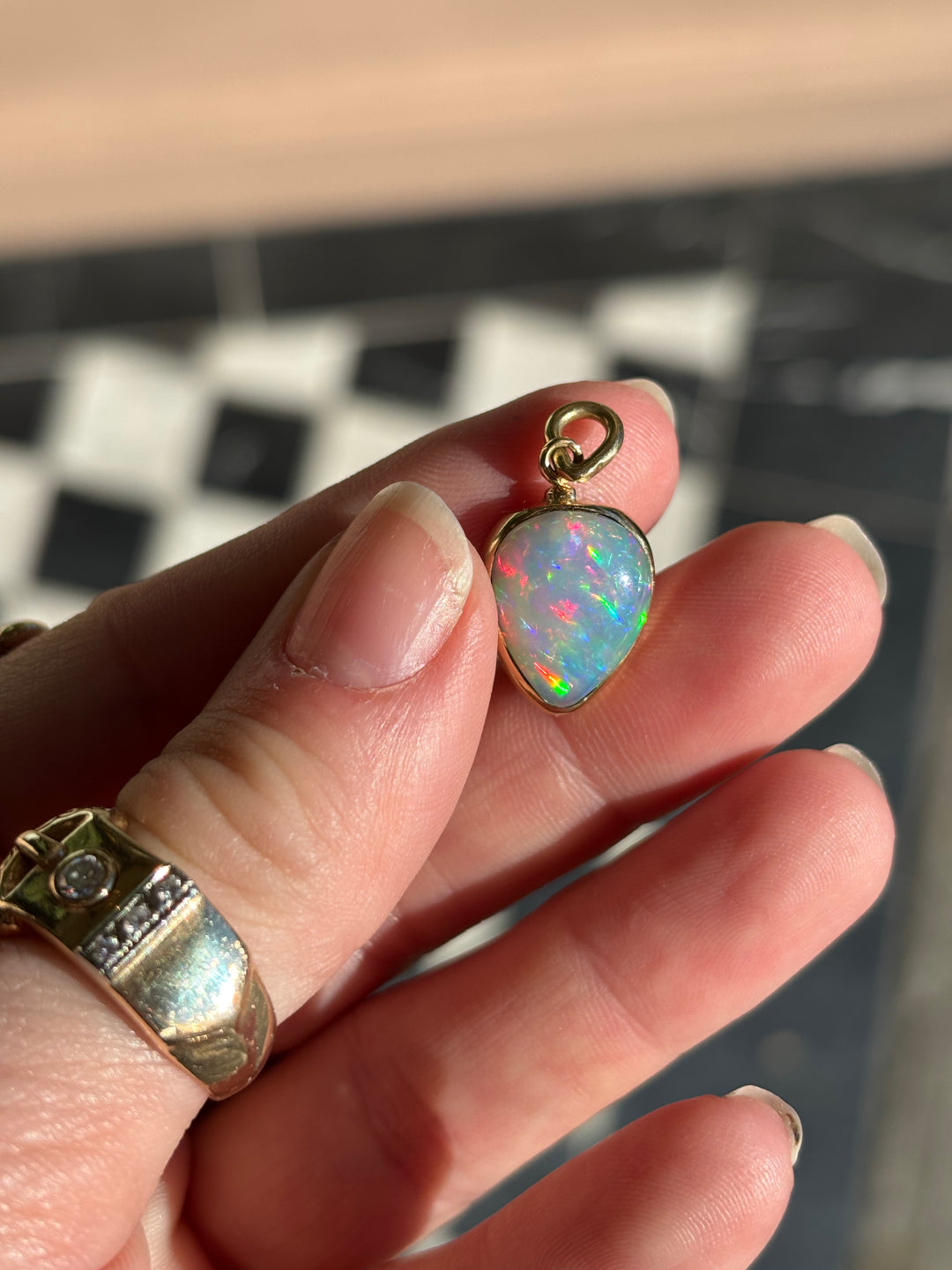 14K & 18K Inverted Pear Shaped Welo Opal Pendant