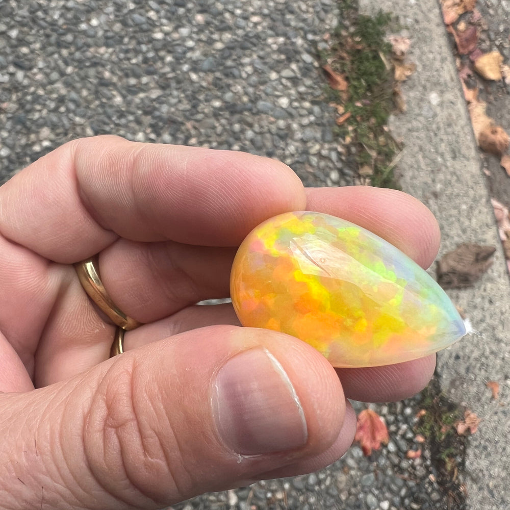 
                      
                        35.20 ct Teardrop x Fiery Ethiopian Welo Opal
                      
                    