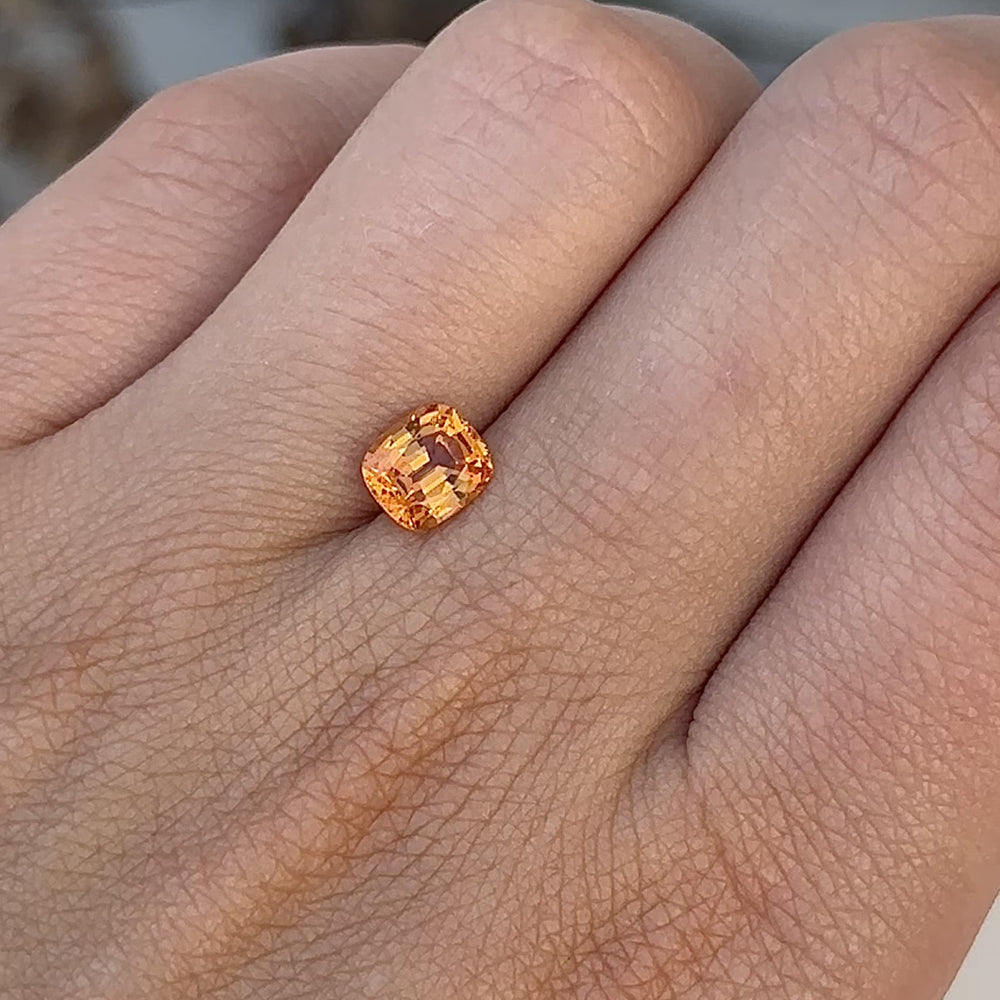 
                      
                        Load and play video in Gallery viewer, Create the jewelry piece of your dreams with this exquisite 1.60-carat cushion-cut mandarin garnet. Radiating a fiery orange hue, this stunning gemstone dazzles with vibrant brilliance in every facet, making it truly one-of-a-kind.
                      
                    