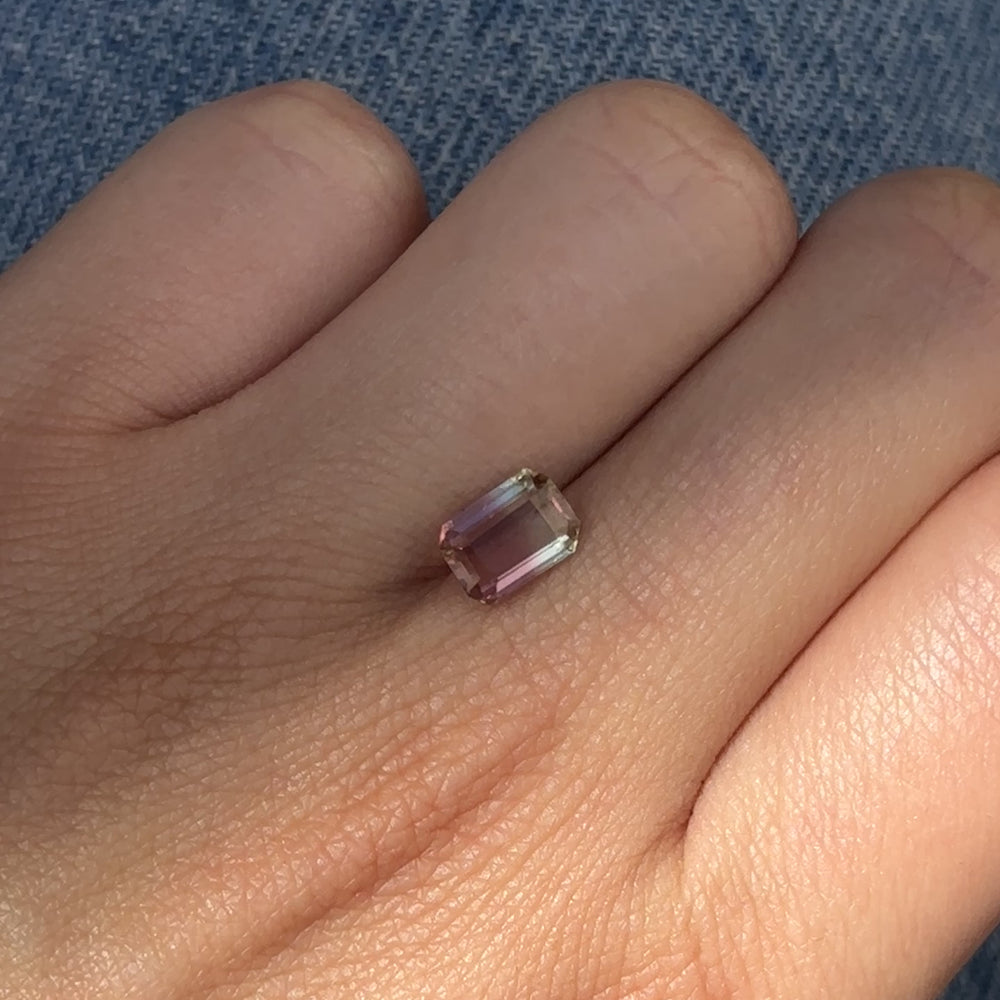 
                      
                        Load and play video in Gallery viewer, Create the jewelry piece of your dreams with this exquisite 1.37ct-carat emerald-cut bi-colour tourmaline. Delicious, sweet pink saturates into gorgeous champagne tones, making this gemstone truly one of a kind.
                      
                    