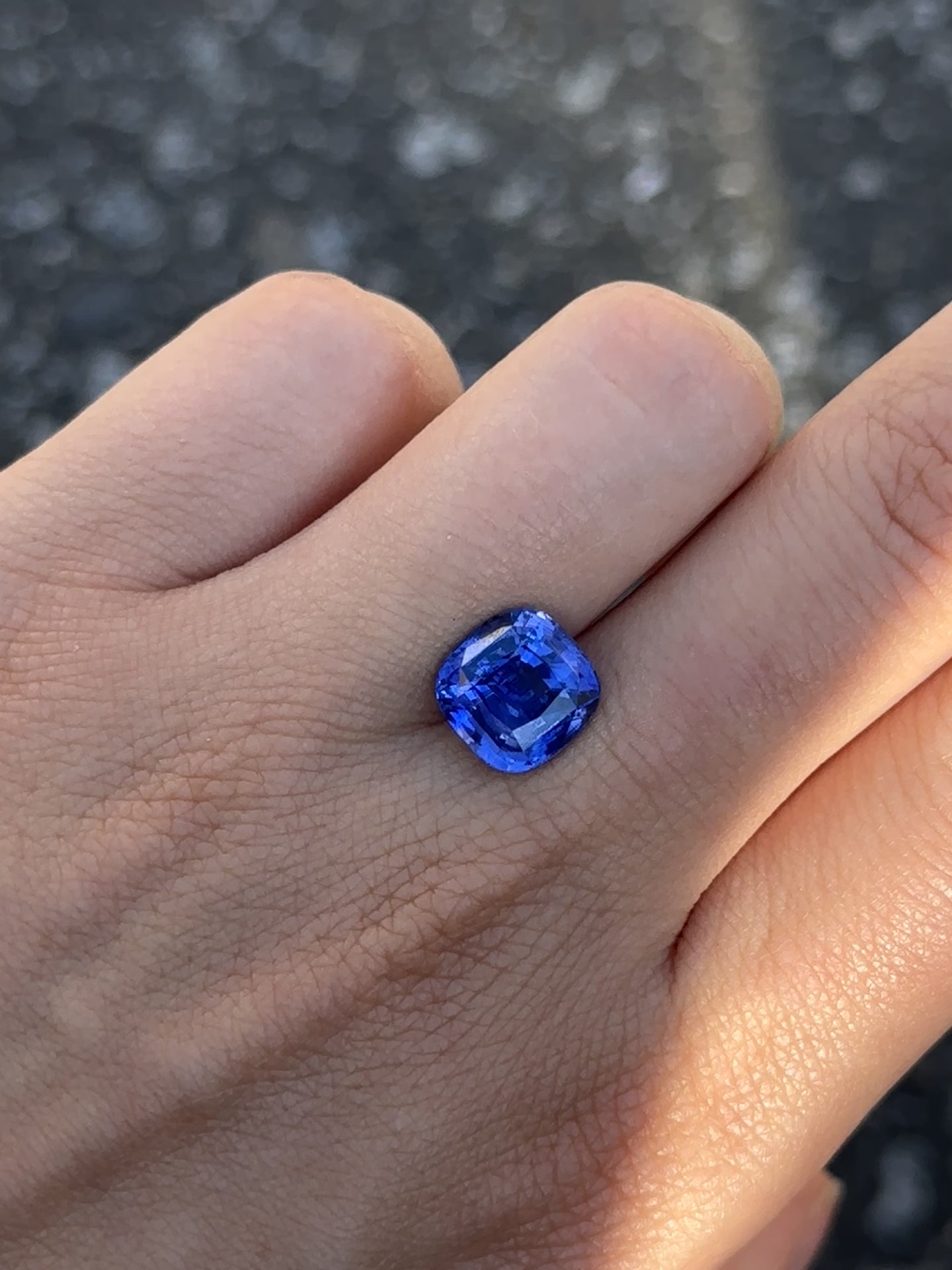 Create the ring of your dreams with this incredible 6.15ct cushion-cut royal blue sapphire. This utterly gorgeous gemstone holds an alluring, regal royal blue colour throughout; a truly one-of-a-kind gemstone.