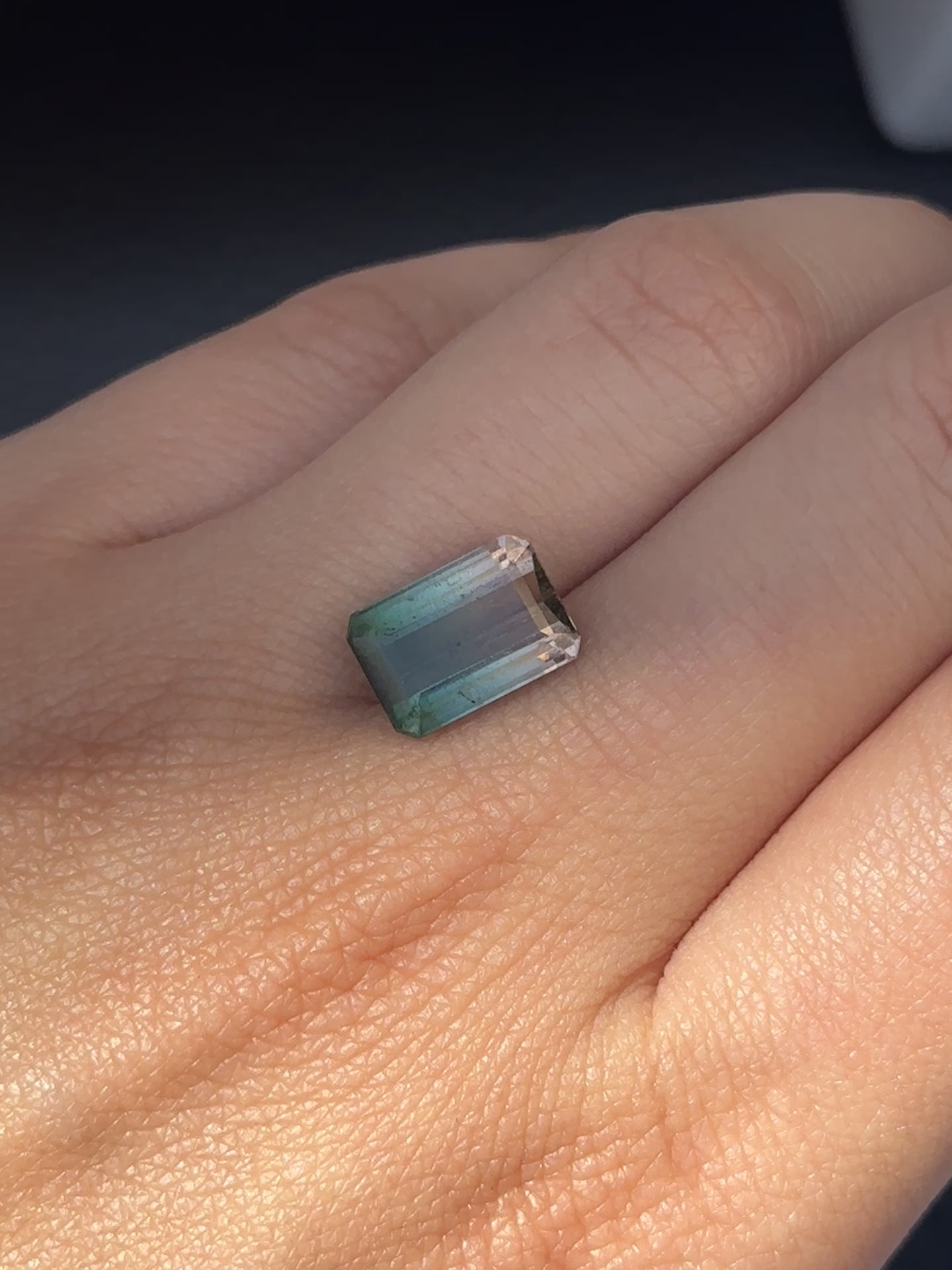 Create the jewelry piece of your dreams with this exquisite 4.38-carat emerald-cut bi-colour tourmaline. Magnetic deep green saturates into a gorgeously vivid light pink, making this gemstone truly one of a kind.  SKU: BCT11 (AUM)