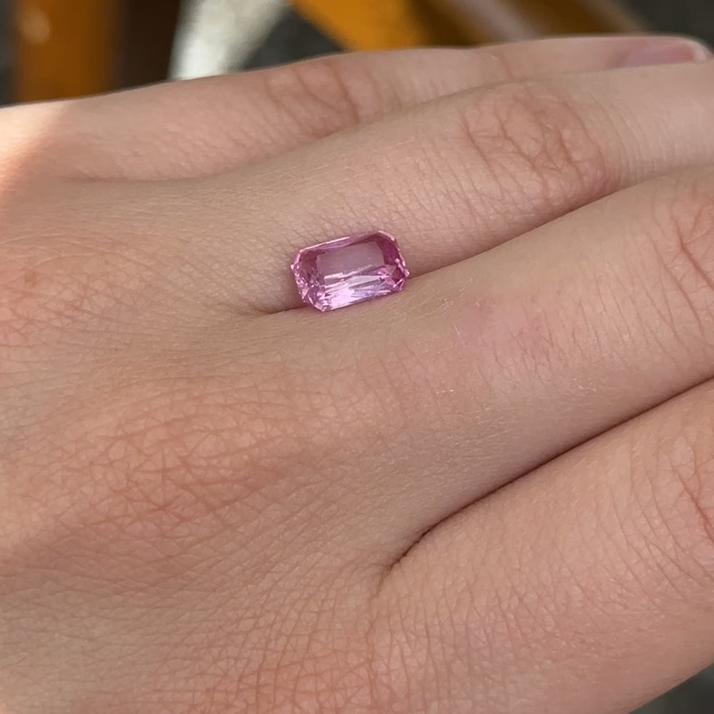 
                      
                        Load and play video in Gallery viewer, Create the ring of your dreams with this 2.20ct elongated, radiant-cut sapphire. This utterly stunning gemstone rocks an unheated, fiery hot pink colour, making it a truly one-of-a-kind gemstone.
                      
                    