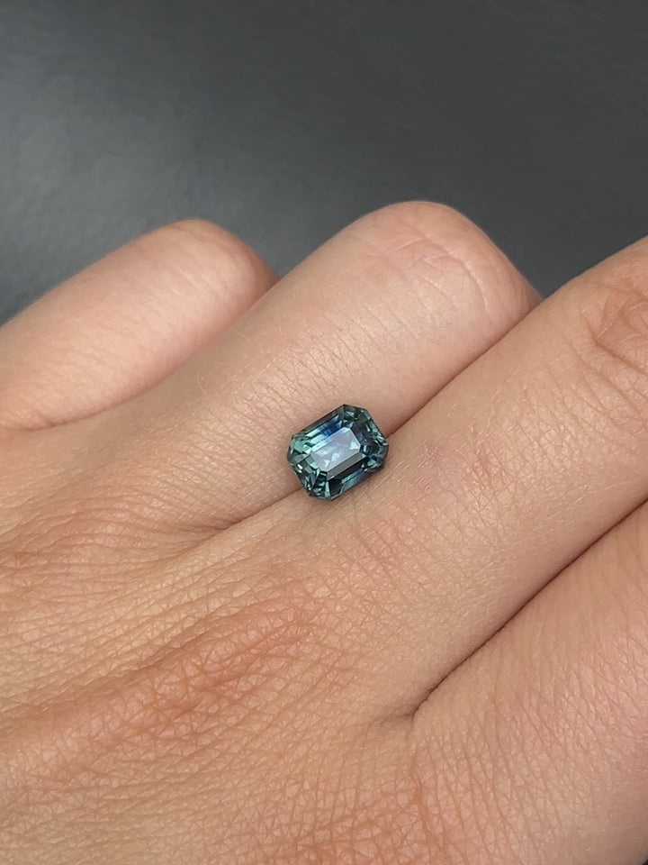 Discover the allure of this utterly exquisite 3.13ct radiant-cut sapphire, perfect for becoming the centrepiece of your dream jewelry. Its mesmerizing facets capture a spectrum of deep blue tones, making it an exceptional and unique gemstone.