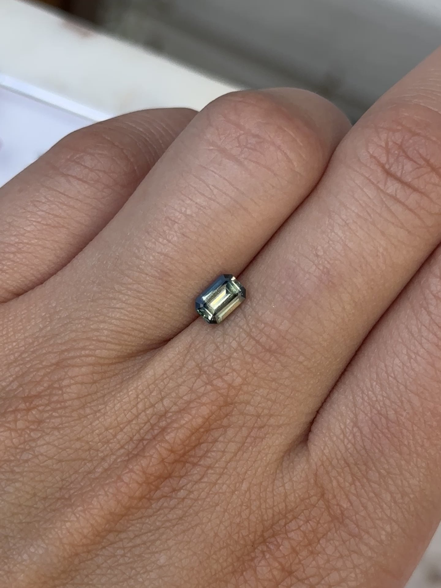 0.75ct Emerald Cut Bi Colour Sapphire