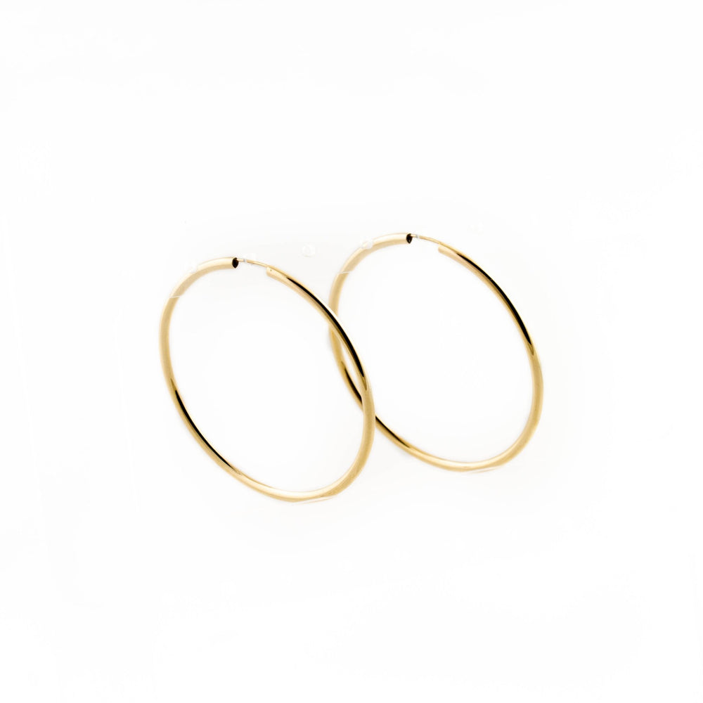 
                      
                        10KT Gold Pipe Hoop - Kingdom Jewelry
                      
                    