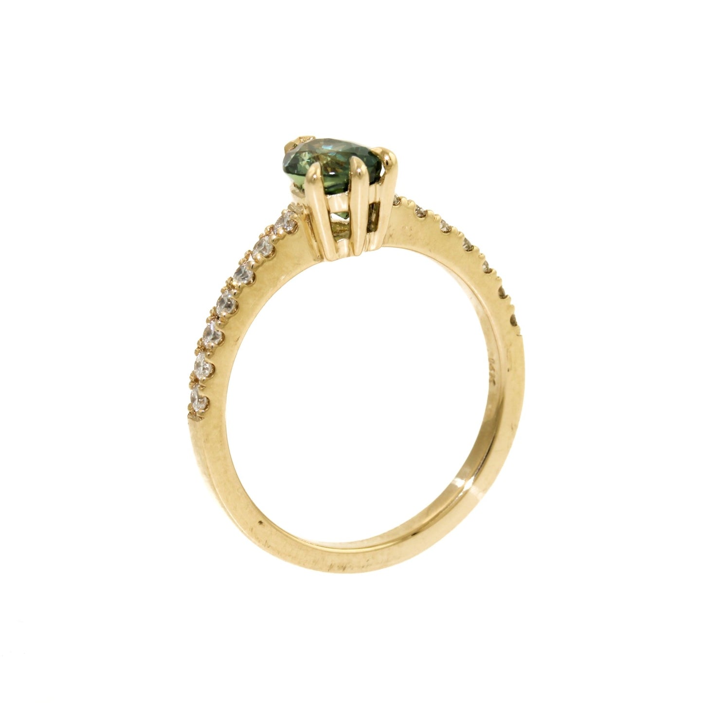 An alluring seafoam green sapphire, cut in the shape of a teardrop to flatter and elongate the finger. This beautiful stone is set in a 14k gold bezel, surrounded by brilliant tiny diamonds.