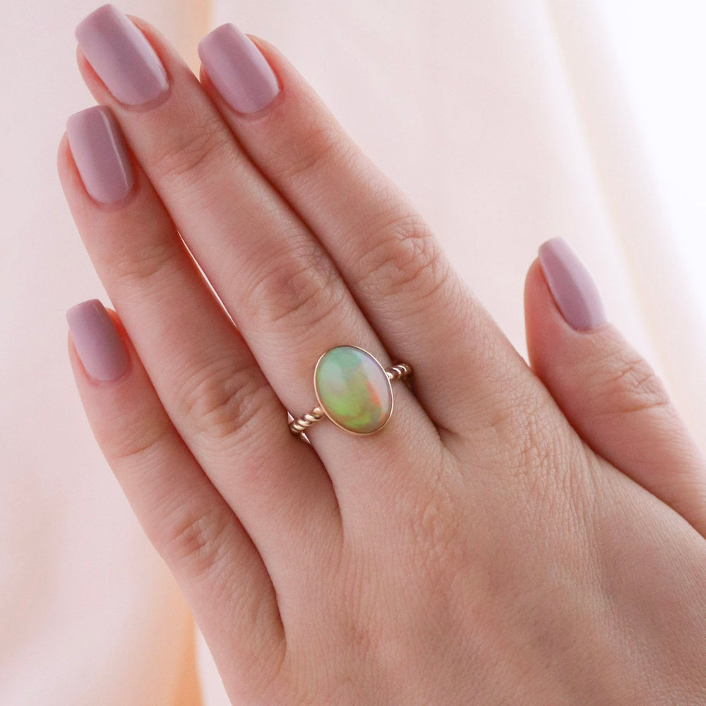 
                      
                        14 KT Gold x Welo Opal Rope-Band Ring - Kingdom Jewelry
                      
                    