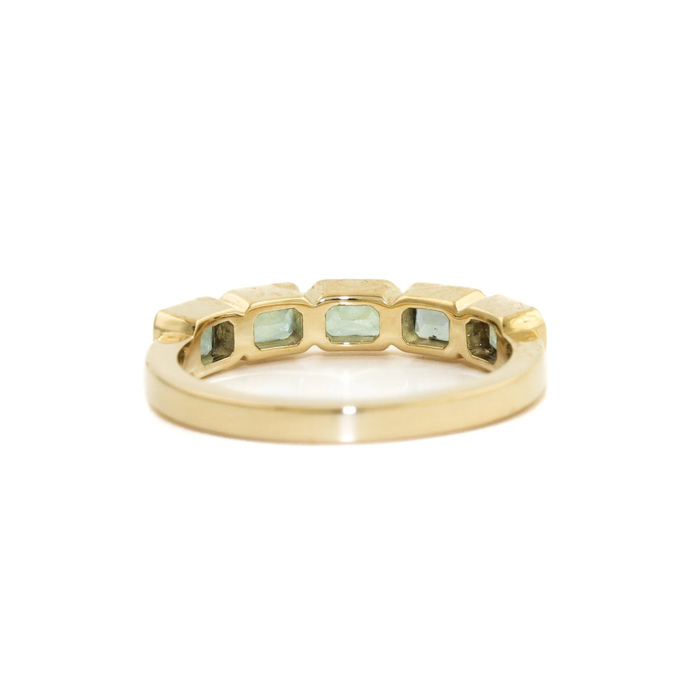 
                      
                        14K Gold Emerald-Cut Teal Sapphire Bezel-Set Band - Kingdom Jewelry
                      
                    