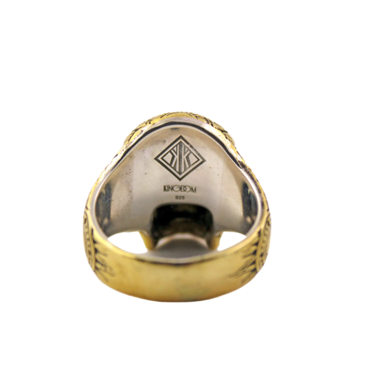 Bold paisley adorned brass skull ring.