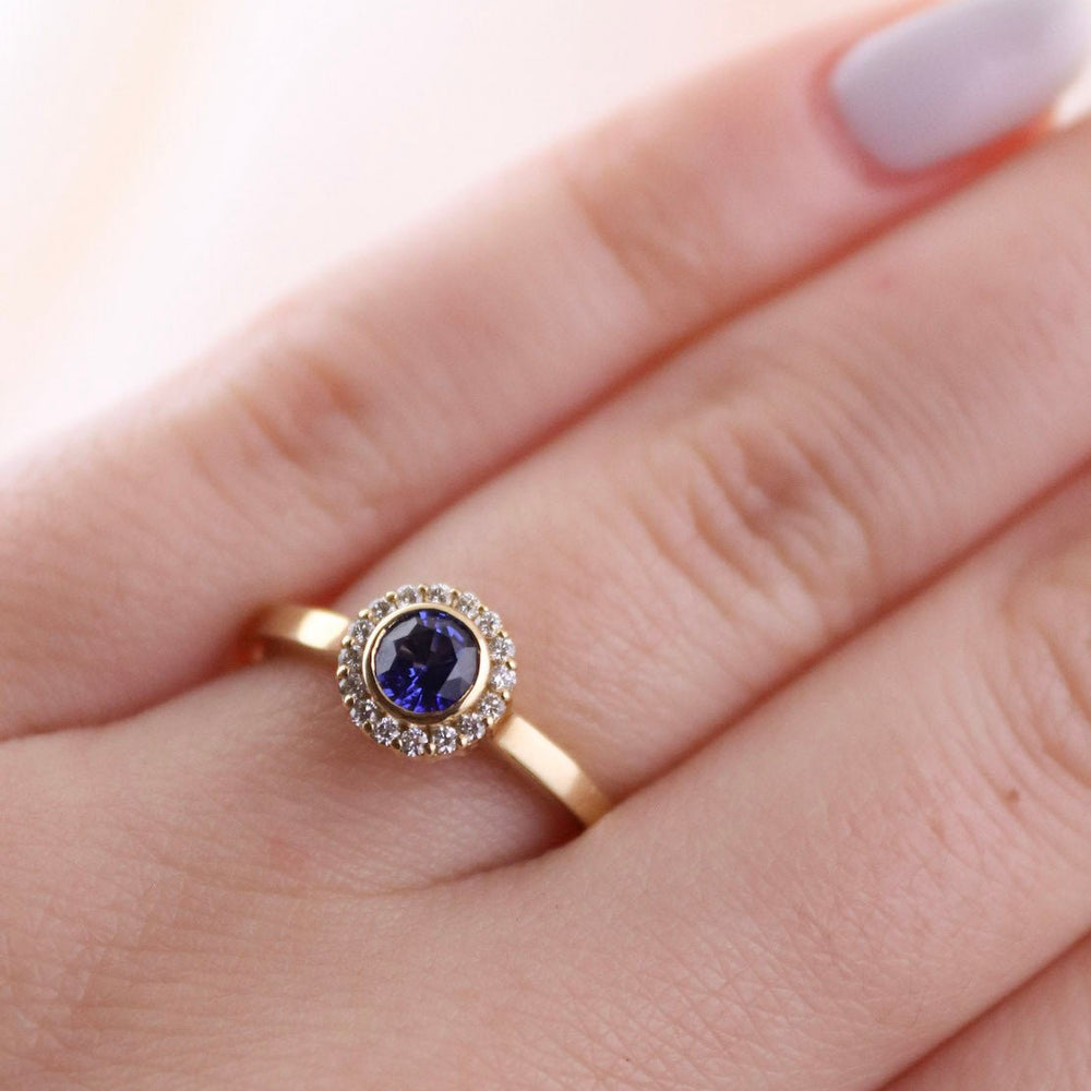 
                      
                        Blue Sapphire Halo Ring - Kingdom Jewelry
                      
                    