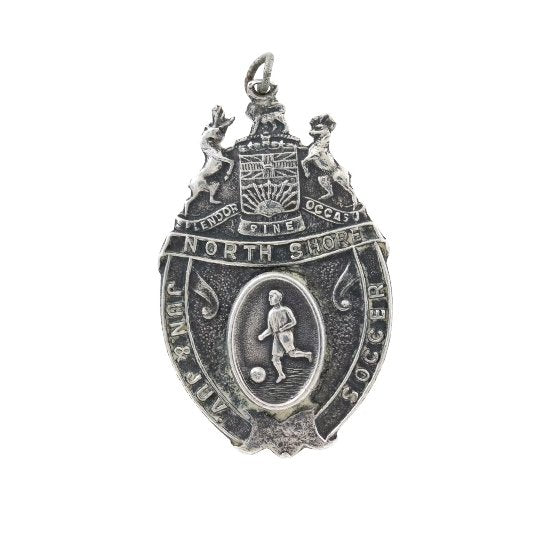 
                      
                        "North Shore Junior & Juvenile Soccer"Pendant - Kingdom Jewelry
                      
                    