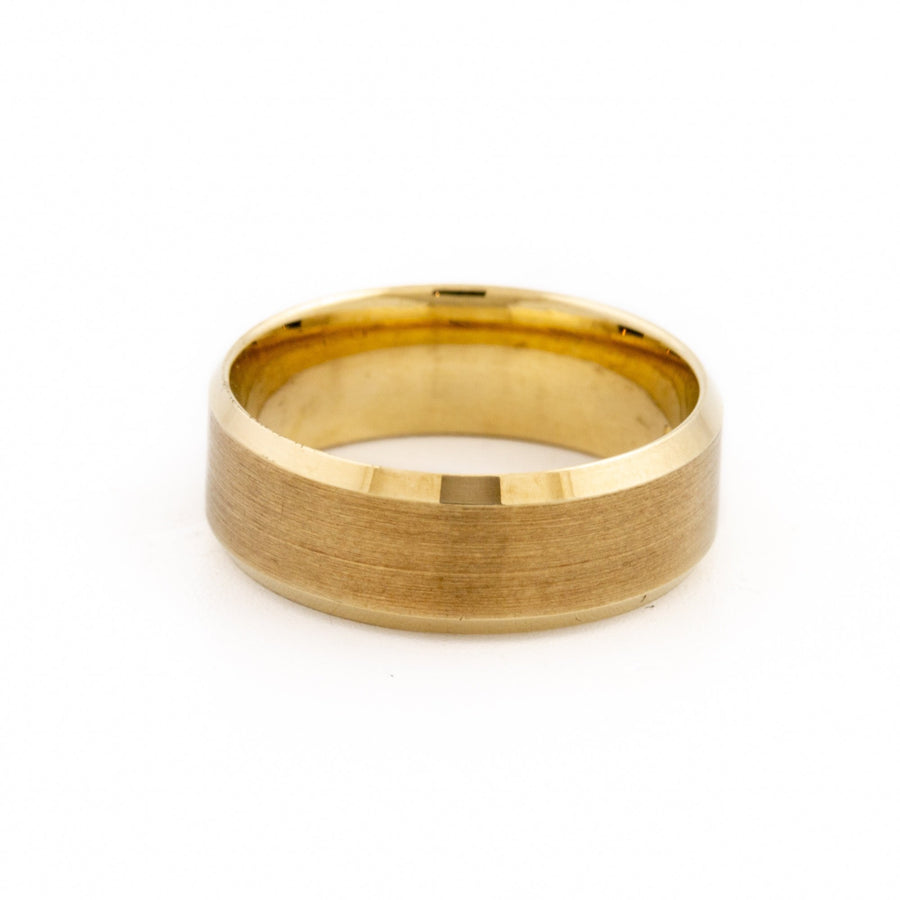 This clean modern ring is a refined and contemporary wedding band, featuring a recessed edge contrasting a brushed and shiny edge. The textured angled design gives it a modern feel and makes for a comfortable ring.