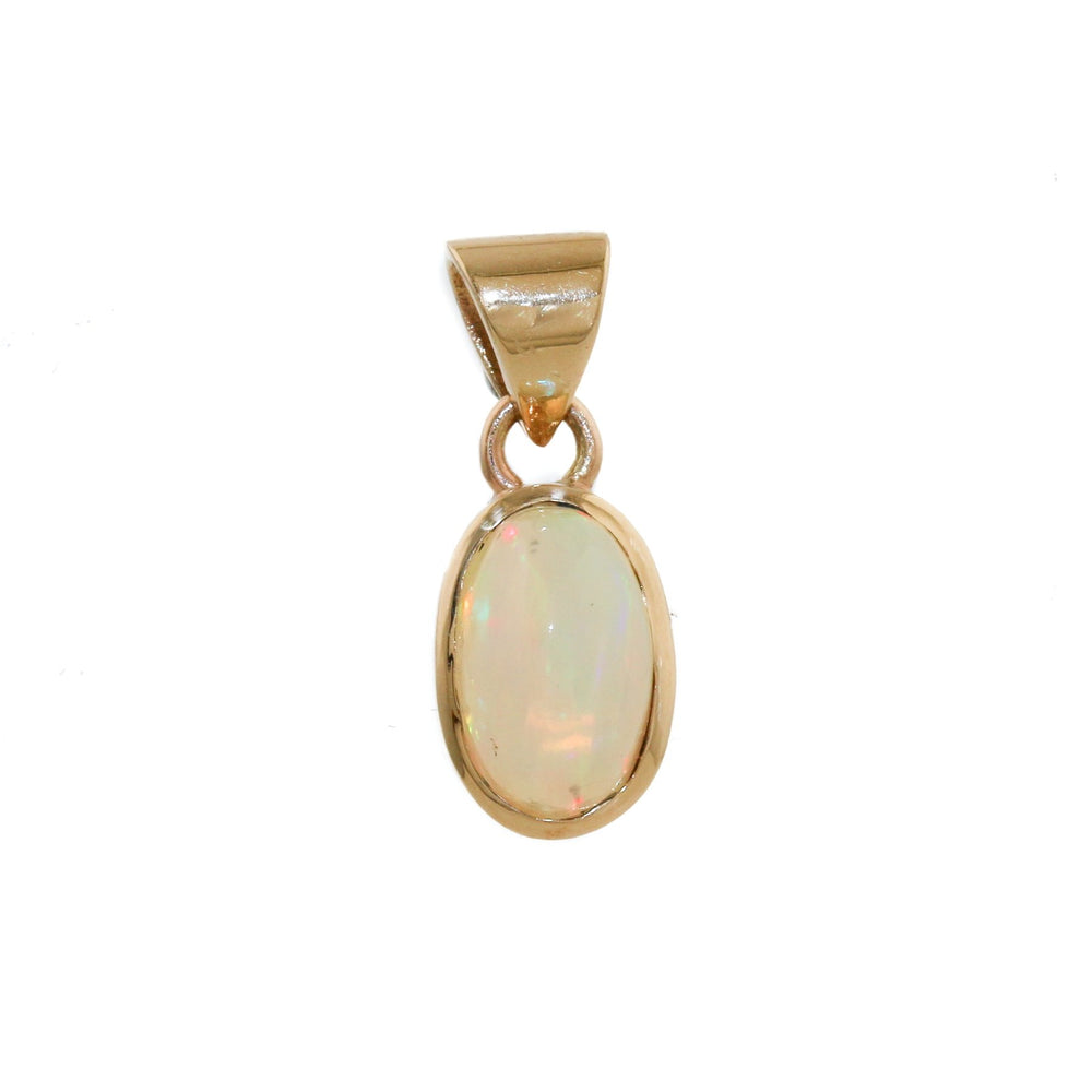 
                      
                        Small Welo Opal 14k Pendant - Kingdom Jewelry
                      
                    