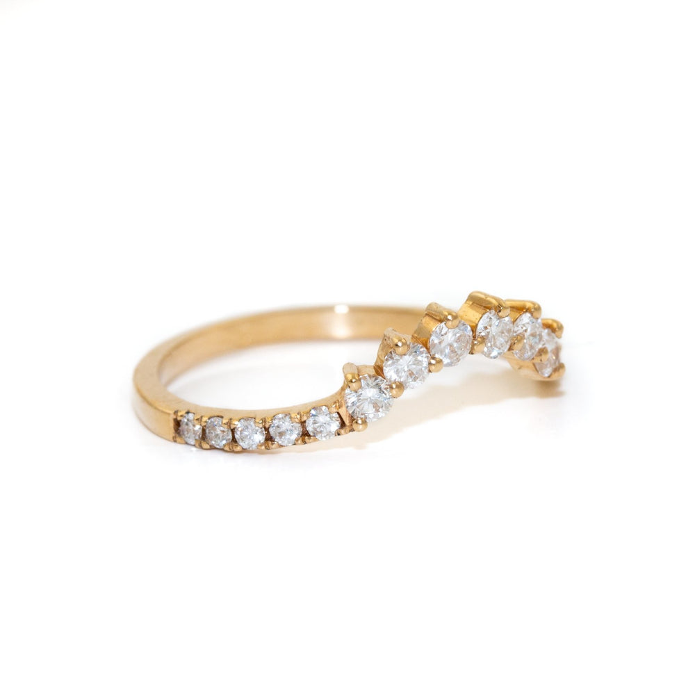 
                      
                        Gorgeous contemporary tiara style ring lined with diamonds that can be stacked with an engagement ring, creating a wedding suite, or stacked up and added to your collection!
                      
                    